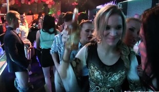 Slutty party chicks fucking in a club